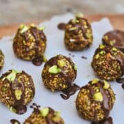 pistachio-balls-on-wood-cutting-board