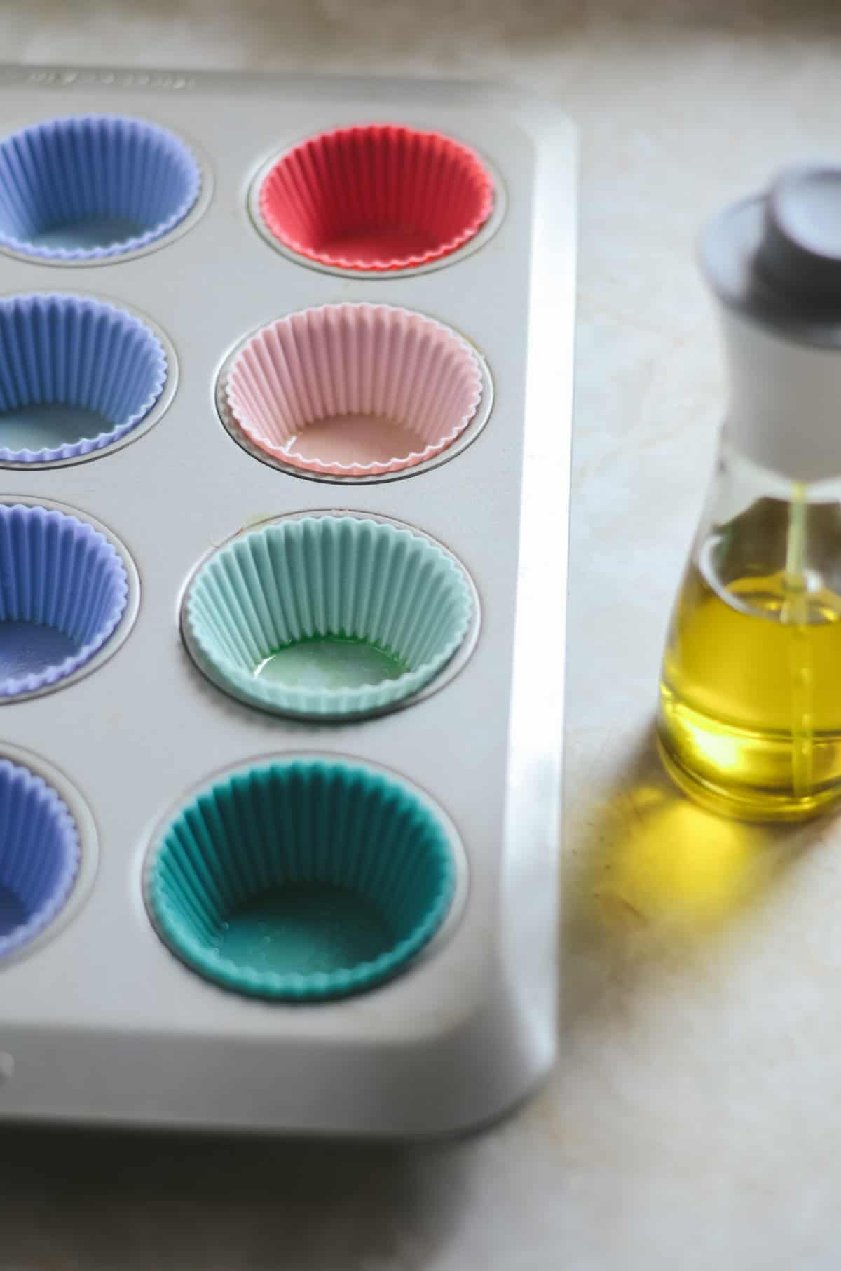 Silicone muffin liners in muffin tray.