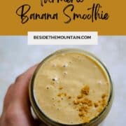 Pinerest pin of yellow banana smoothie with turmeric powder.