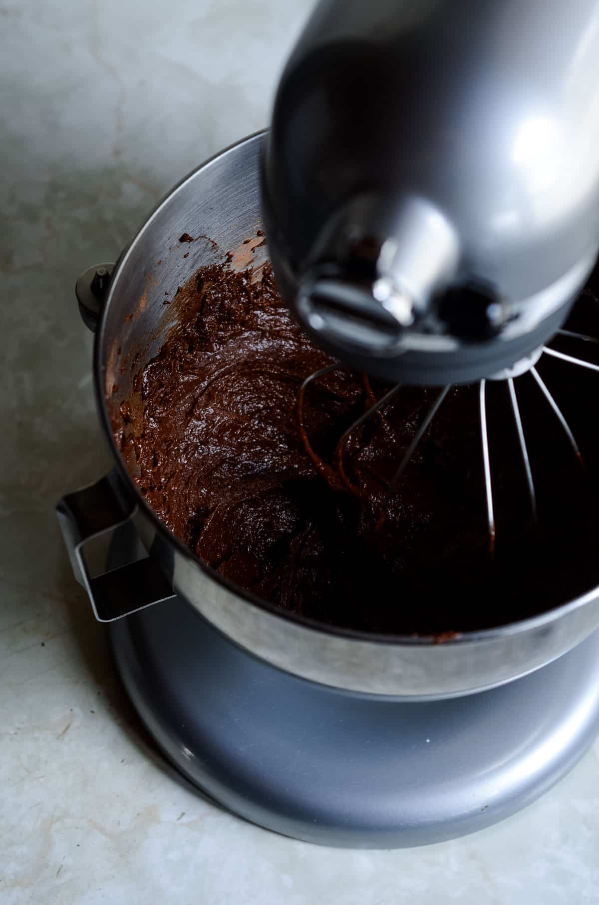 Healthy sweet potato chocolate brownie batter in kitchen aid mixer bowl.