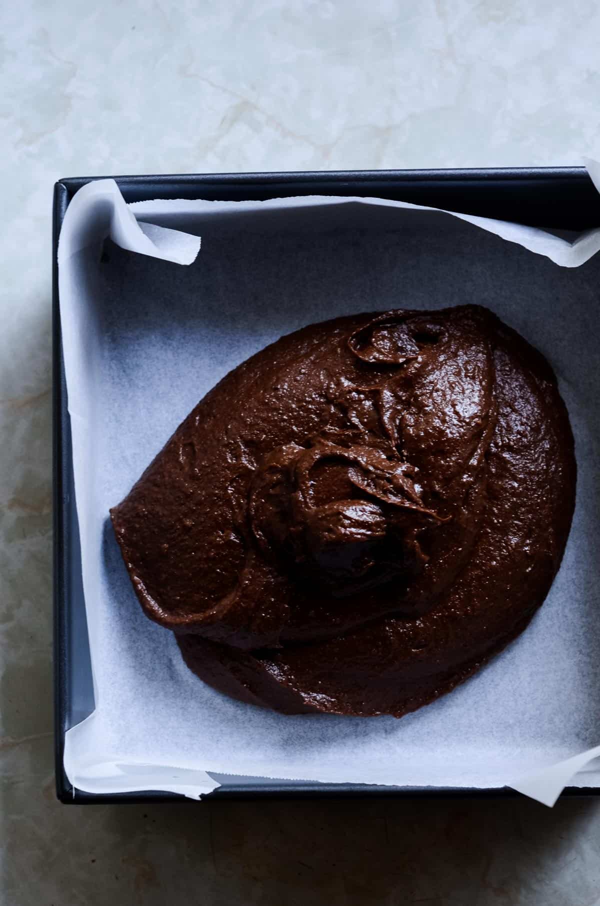 Brownie batter in 8x8 pan.