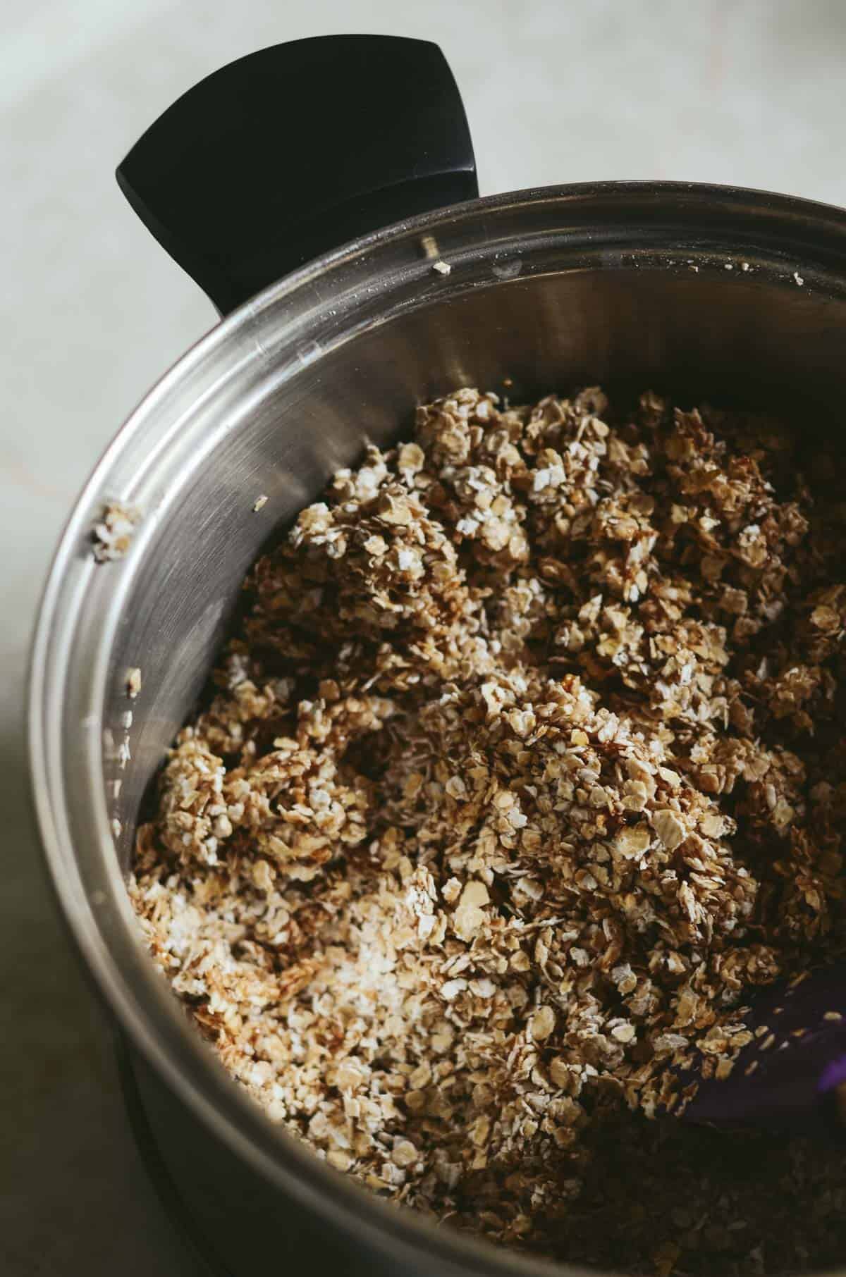 Quick oats, mixed with honey for hiking oat bars.