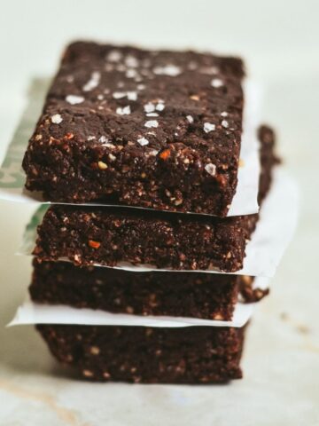 High protein rx bars stacked on top of each other with sea salt and chocolate.