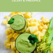 Pin graphic with two green smoothies and celery cut lengthwise.
