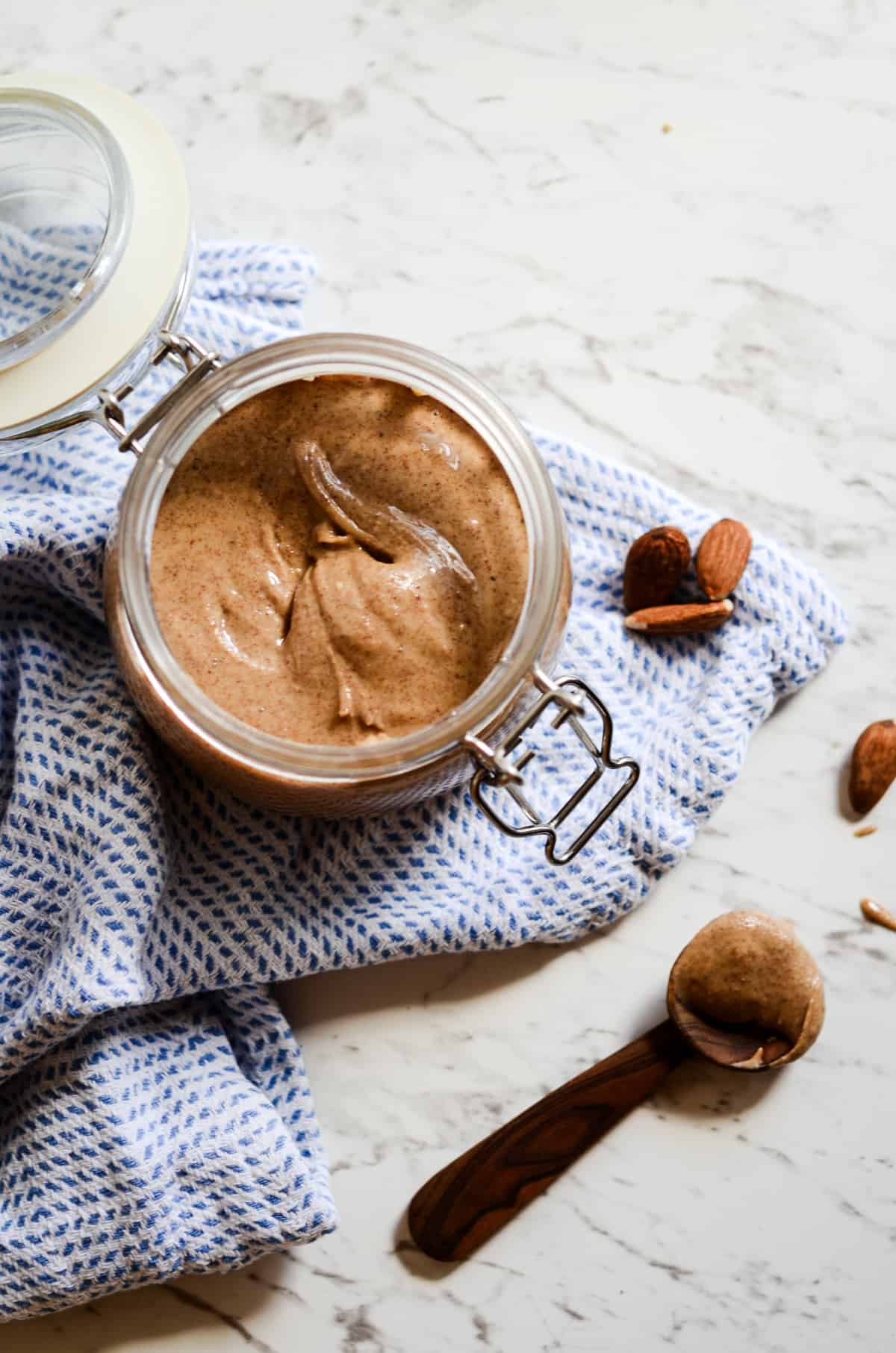 Homemade almond butter in a clasp jar.