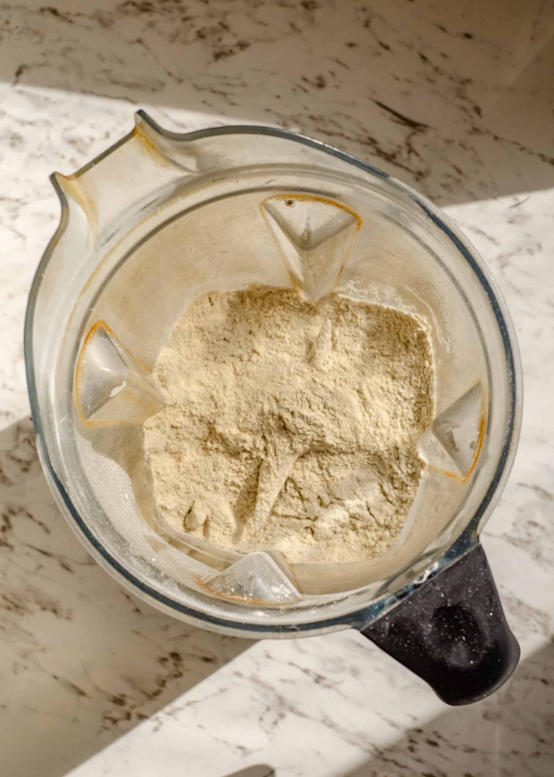 Buckwheat groats that have been freshly grinded into a powder in a vitamix blender.