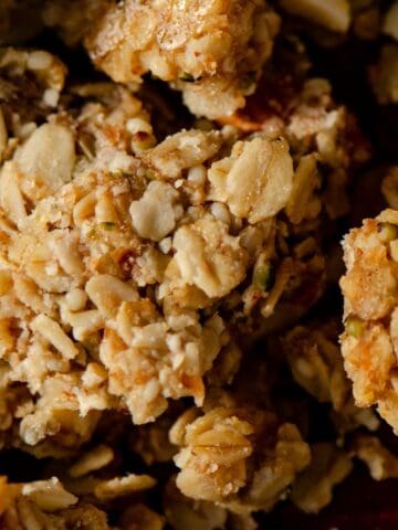 A chunk of granola with oats and hemp hearts.