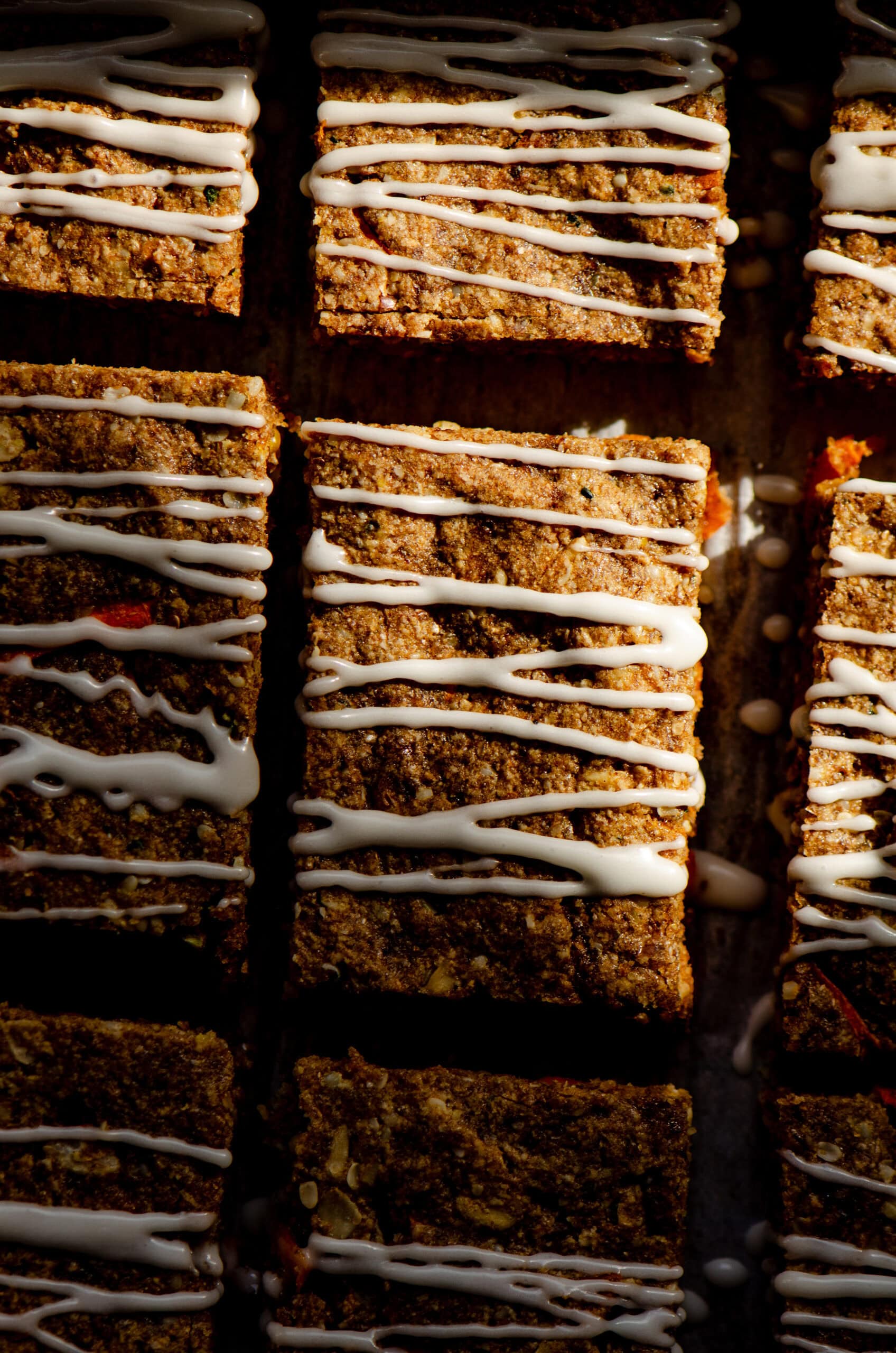Brown rectangular bars with a white drizzle across them.