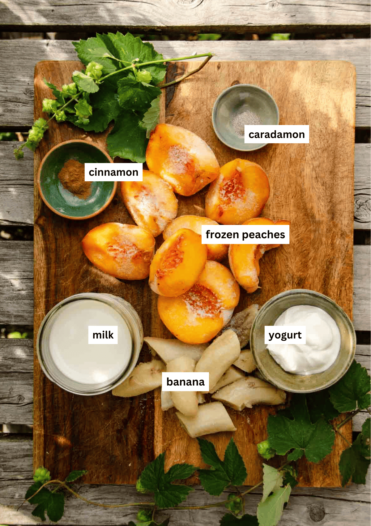 A cutting board with ingredients measured out for a smoothie.